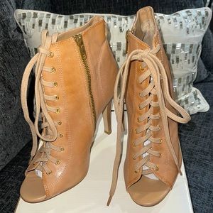 These Cute Aldo booties comes with changeable shoestrings to add to your look!